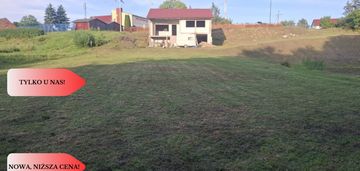 Duża działka z domem w budowie z dostępem do rzeki