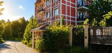 Apartament z garażem i balkonem