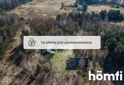 Na sprzedaż drewniany dom w lesie z działką 80 ar