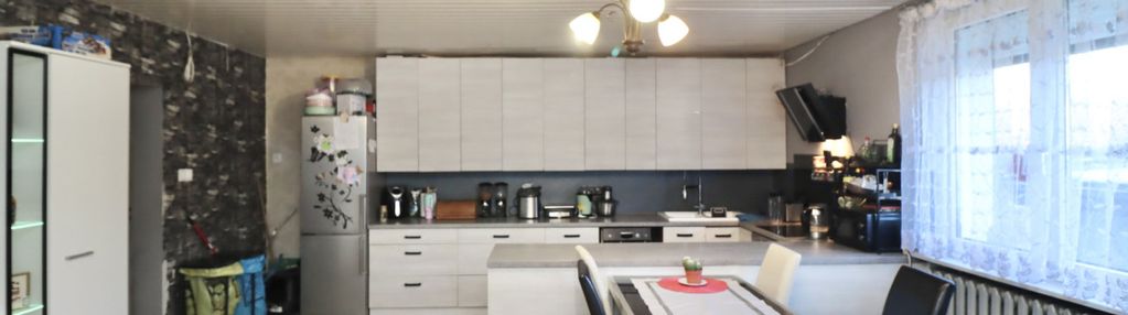 Skrajny dom w zabudowie szeregowej – świerczewo