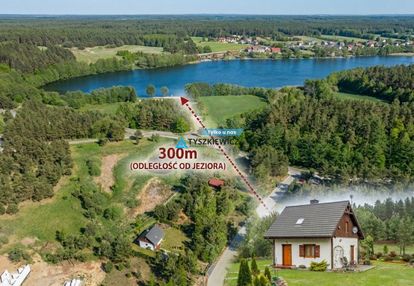Urokliwy dom, otoczony drzewami, nad j.kamieniczno