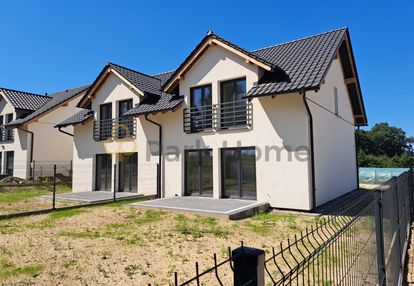 Dom w zabudowie bliźniaczej z garażem