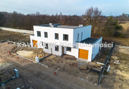 Nowy w stanie deweloperskim dom-bliźniak
