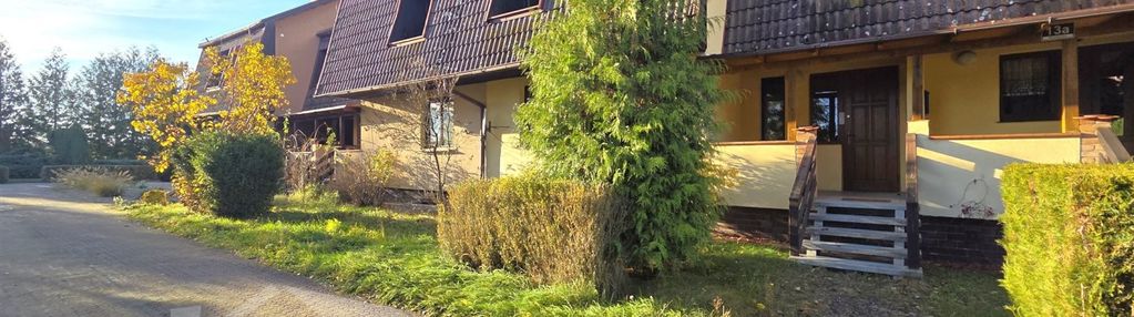 Włoszakowice, dom z dwoma garażami i ogrodem