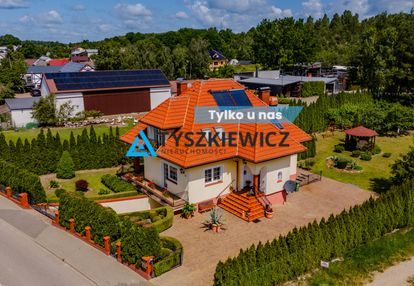 Atrakcyjny dom z pięknie zagospodarowanym ogrodem