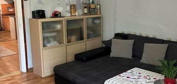 Mieszkanie w drewnianym domku wielorodzinnym