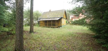 Zielona enklawa w otulinie lasów