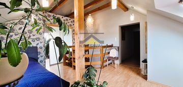 Dwupoziomowe mieszkanie z narożnym tarasem