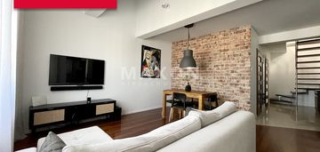 Dwupoziomowy apartament w stylu loftowym