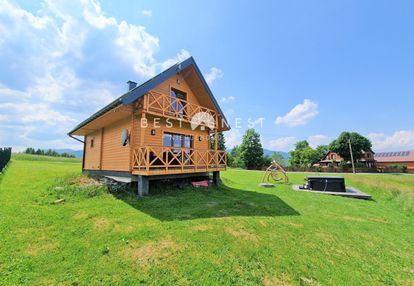 Dom z drewna z dużą, widokową działką nowa cena