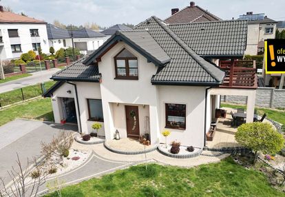 Piękny dom z ogrodem i garażem - rogów