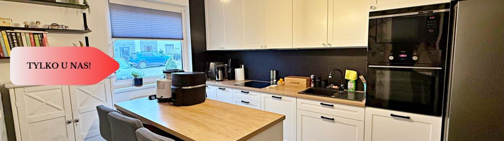 Nowoczesny dwupoziomowy segment z ogródkiem