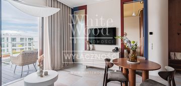 Designerski apartament z widokiem na marinę