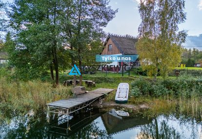 2 domy z linią brzegową jeziora i opcją wynajmu!