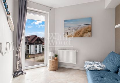 Dupoziomowy apartament z dwoma balkonami