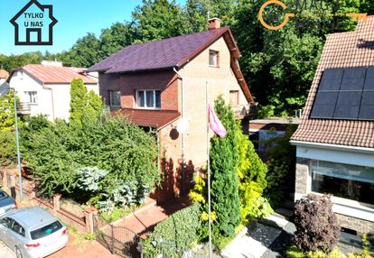 Dom ze ścianą lasy | wolnostojący | ogród | garaż