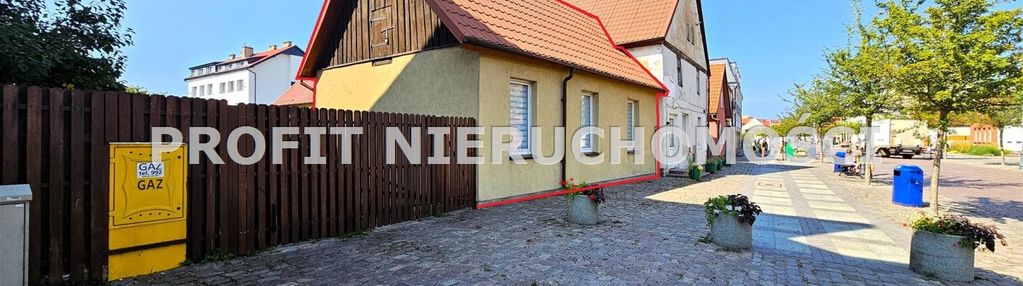 Mieszkanie z garażem z nadobudówką w centrum