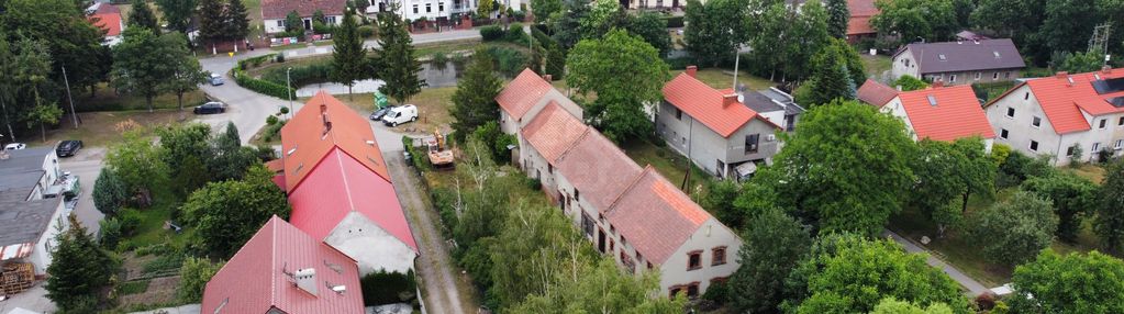 Działka zabudowana budynkiem mieszkalno-gosp.