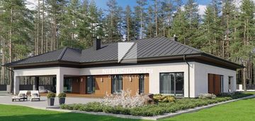 Działka budowlana otoczona lasem w pobliżu jeziora