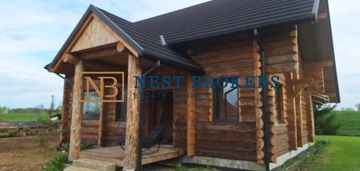 Dom z bali na dużej działce z projektem zabudowy