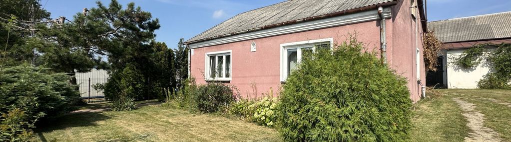 Dom z dużą działką i budynkami gospodarczymi