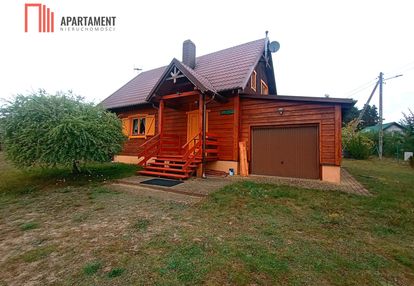 Drewniany wiejski dom w borach tucholskich