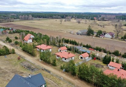 Dom w stanie surowym nad rzeką pisa piasutno żelazne