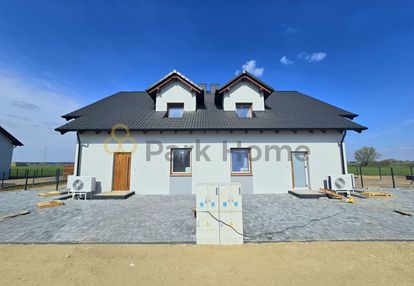 Cztery pokoje z ogródkiem i 2 miejsca postojowe