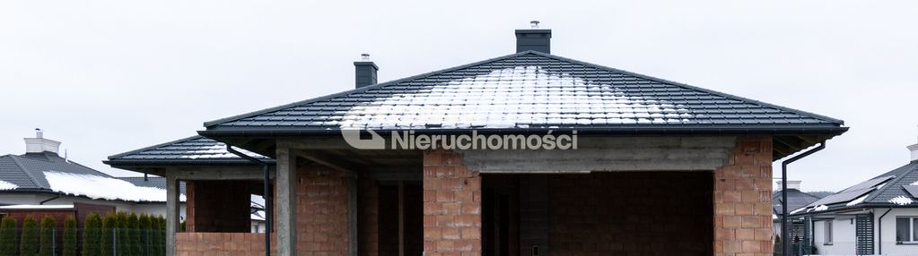 21 arów, garaż i budynek gospodarczy.