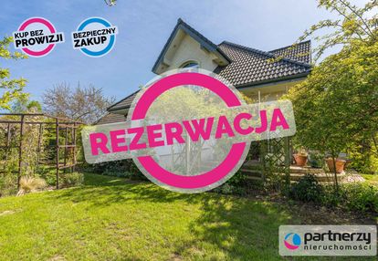 Komfortowy, nowoczesny dom z pięknym ogrodem