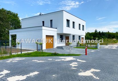 Nowy w stanie deweloperskim dom-bliźniak