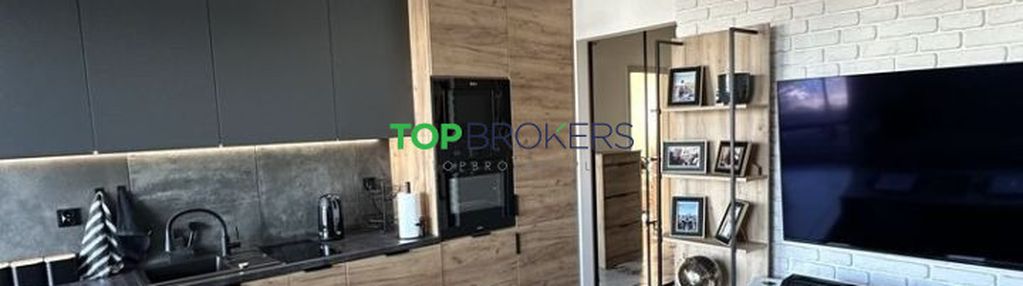 Nowoczesny salon z aneksem i sypialnia, garaż