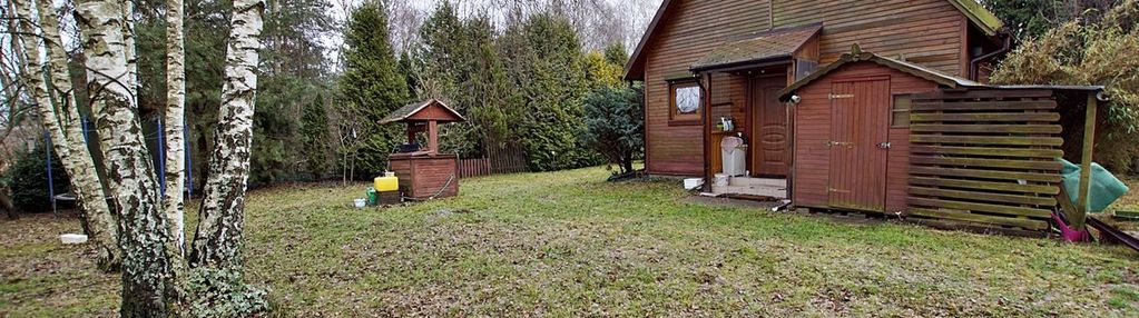 Duża działka budowlana z domkiem rekreacyjnym.