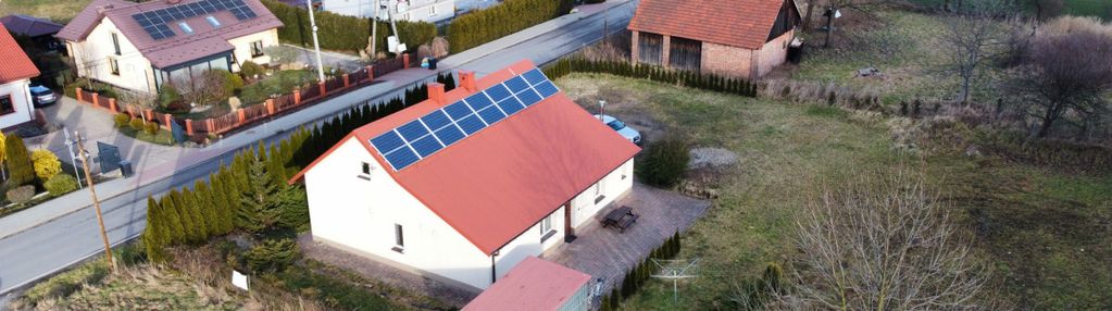 Duża działka z domem z potencjałem inwestycyjnym