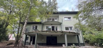 Dom z ogrodem i częścią usługową zasanie