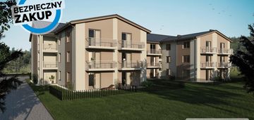 Nowe budownictwo w otoczeniu lasu