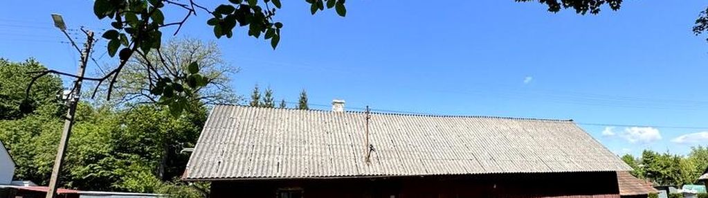 Drewniany dom na 13 ar działce- chorkówka.