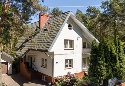 Wyjątkowo zadbany dom z garażem i cudnym ogrodem!