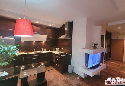 50m2,parter, 2pokoje,2balkony,oś.zamknięte-centrum