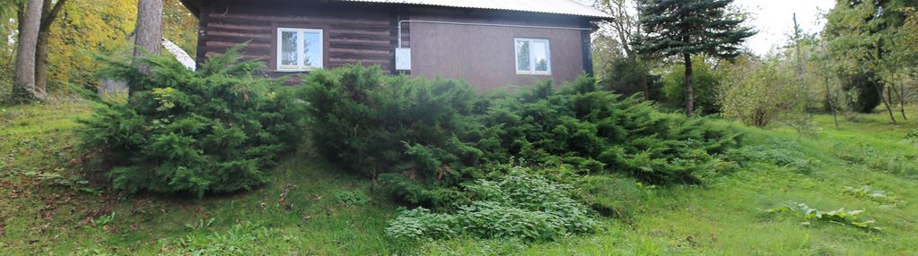 Urokliwy drewniany dom z działką 1,53 ha