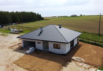 Parterowy dom na widokowej działce, st. dewel.
