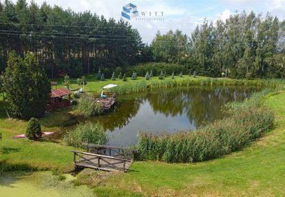 Dom z dwoma stawami i urokliwym lasem