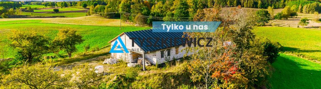 Działka z rozpoczętą budową domu w ciemnie