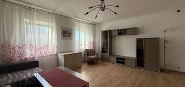 Mieszkanie z ogrodem i garażem