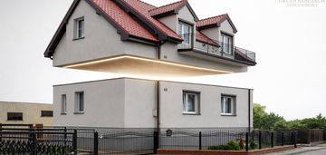 Dom z dwoma mieszkaniami i dużą działką