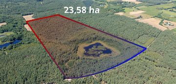 Duża działka z lasem i oczkiem wodnym