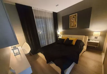 Apartament w stylu loftowym z garażem i ogródkiem