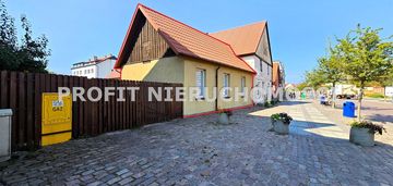 Mieszkanie z garażem z nadobudówką w centrum