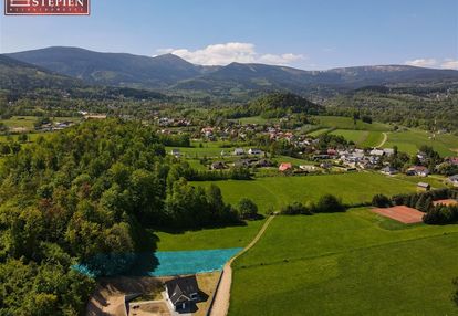 Działka w otulinie lasu pod posiadłość.