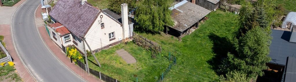 Dom z zabudowaniami gospodarczymi, duża działka